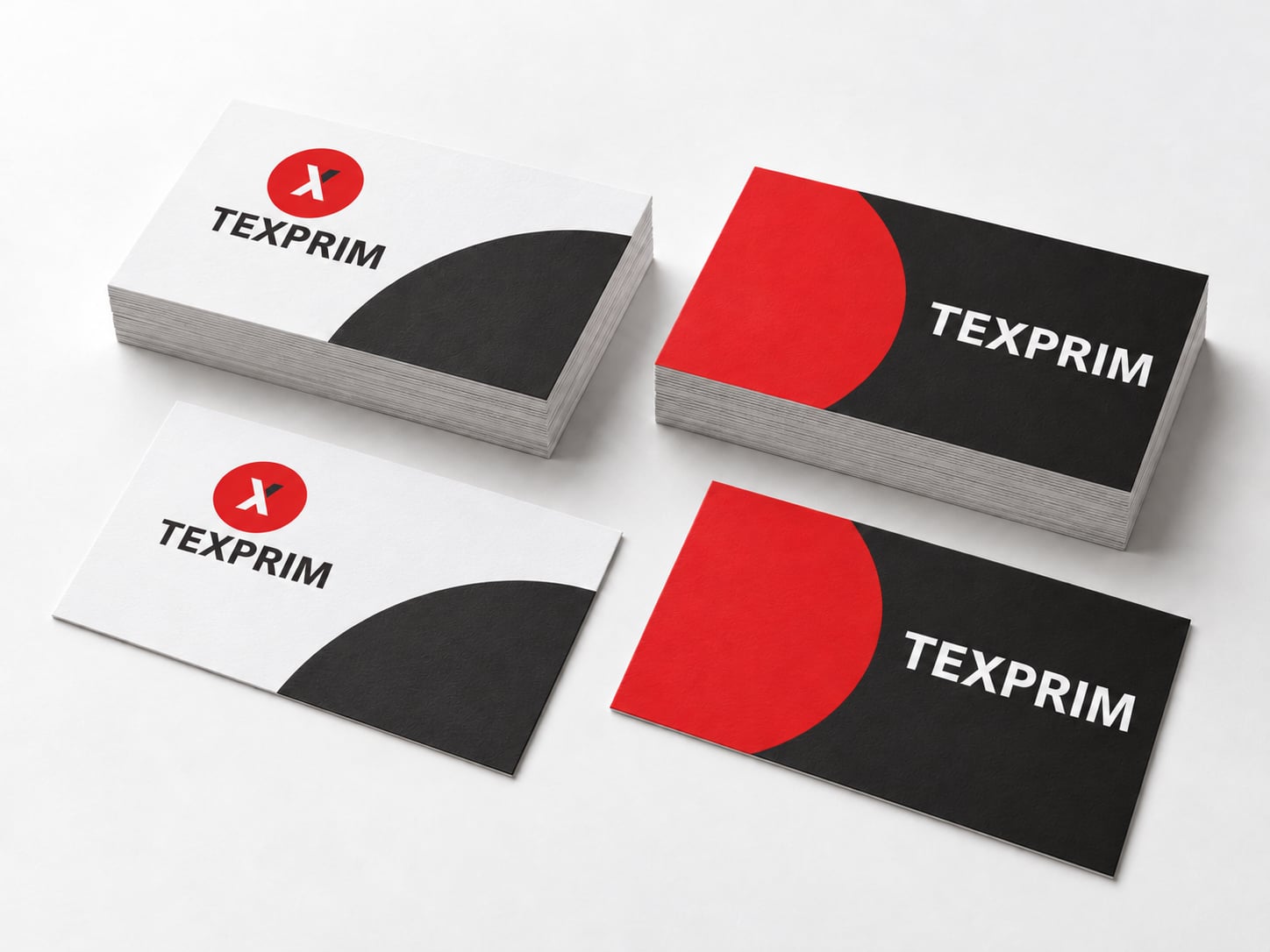 Mise en scène de cartes d’affaires avec le logo Texprim sur les faces blanches et le nom Texprim sur les versos anthracite.